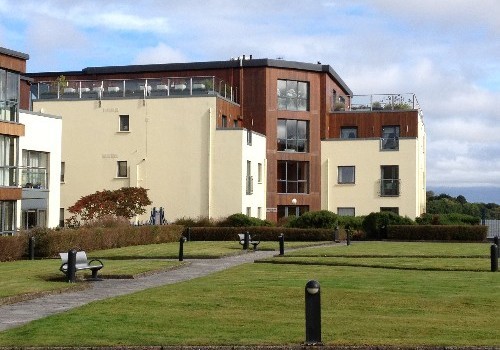 Photograph of atrium windows and paths at Hartys Quay Apartments